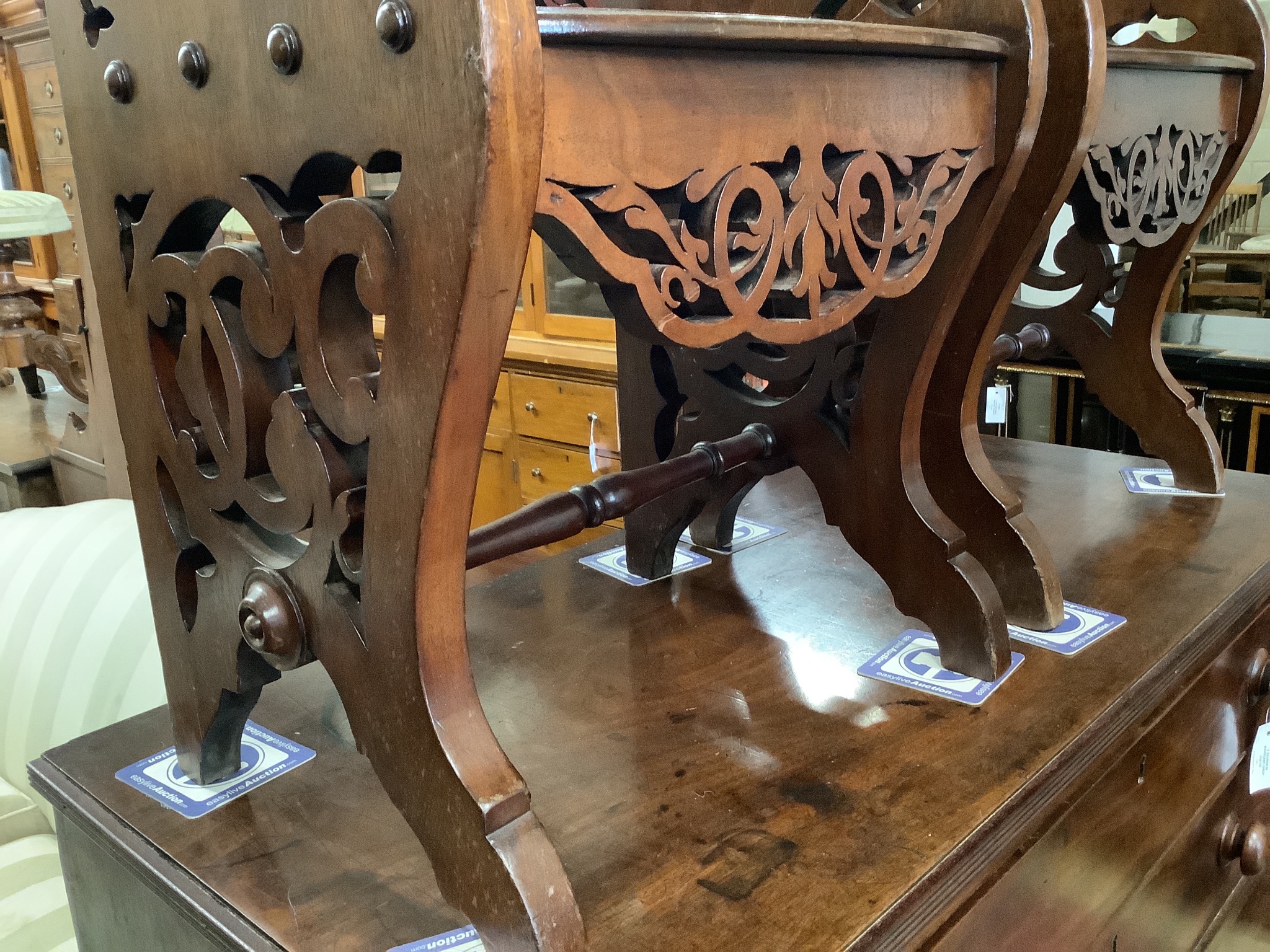 A pair of Victorian mahogany hall seats in the manner of Shoolbred. W-47, D-38, H-76cm.